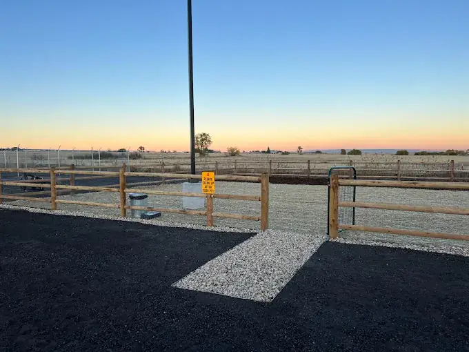 Fenced dog park at sunset on the Colorado prairie